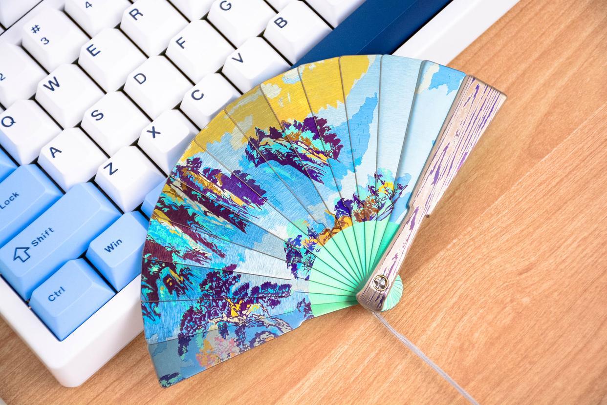 The real man's speed bump! Fego all-titanium alloy mini painted fan: EDC palm art piece